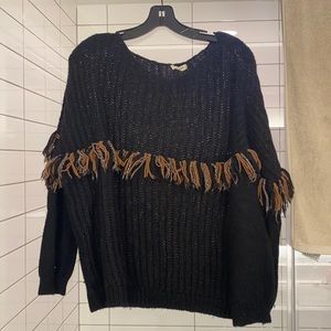 Black woven sweater with fringe